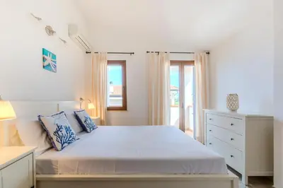 Letto o letti in una camera di Coralline Apartment