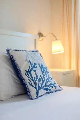 Letto o letti in una camera di Coralline Apartment
