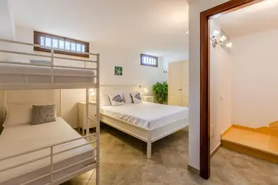 Letto o letti in una camera di Coralline Apartment