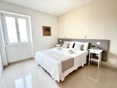 Letto o letti in una camera di Casa 421