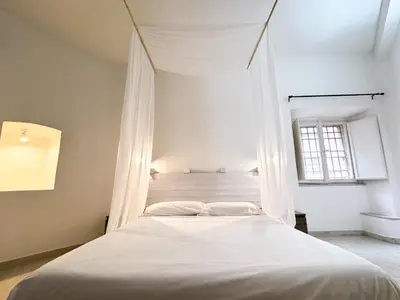 Letto o letti in una camera di Kalma - Vico Collegio Marina