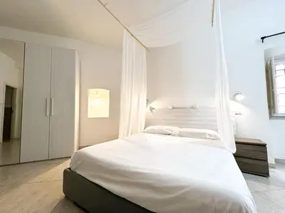 Letto o letti in una camera di Kalma - Vico Collegio Marina