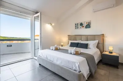 Letto o letti in una camera di Casa Giulia