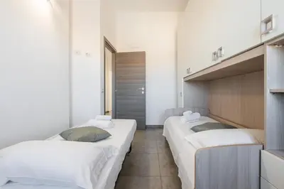 Letto o letti in una camera di Casa Giulia