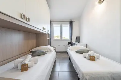 Letto o letti in una camera di Casa Giulia