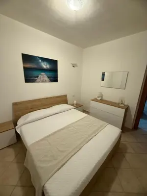 Letto o letti in una camera di Casa di Coco