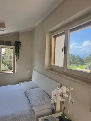 Letto o letti in una camera di La terrazza sul Golfo