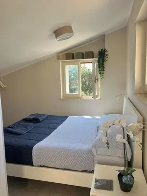 Letto o letti in una camera di La terrazza sul Golfo