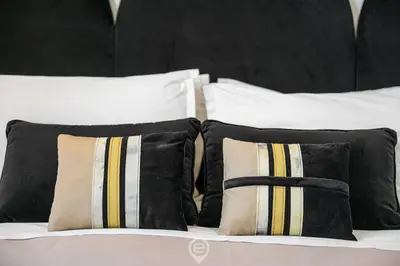 Letto o letti in una camera di Biora Hospitality