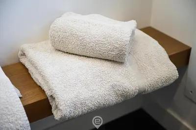 Letto o letti in una camera di Biora Hospitality