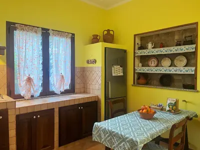 Cucina o angolo cottura di Open Space s'Ollastu con WiFi, Patio e Aria Condizionata