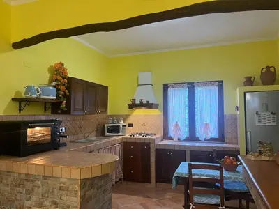 Cucina o angolo cottura di Open Space s'Ollastu con WiFi, Patio e Aria Condizionata