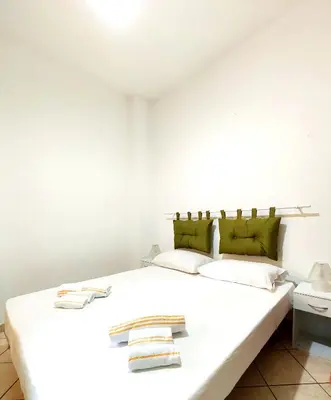Letto o letti in una camera di Gamm Simius Home Holiday