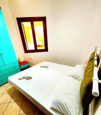 Letto o letti in una camera di Gamm Simius Home Holiday