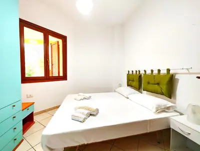 Letto o letti in una camera di Gamm Simius Home Holiday