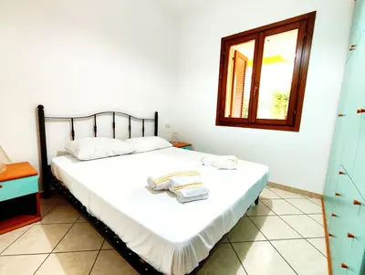 Letto o letti in una camera di Gamm Simius Home Holiday