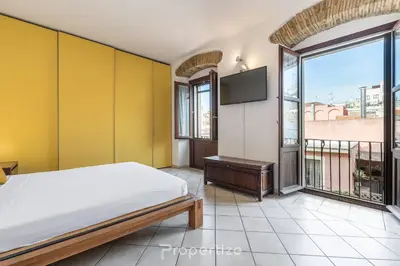 Letto o letti in una camera di Domu Arké by Propertize