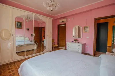 Letto o letti in una camera di Villa Corsica