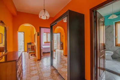 Letto o letti in una camera di Villa Corsica