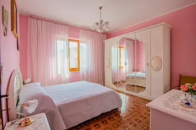 Letto o letti in una camera di Villa Corsica