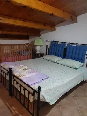 Letto o letti in una camera di Casa Vacanze DESIREE'