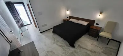 Letto o letti in una camera di INN My Place