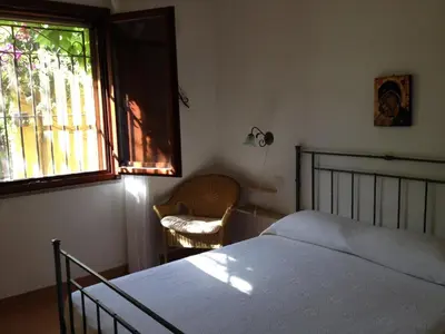 Letto o letti in una camera di Villetta Stella Marina