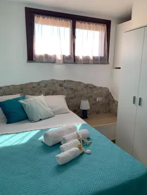 Letto o letti in una camera di La villetta di Kelly