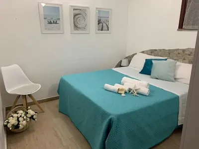 Letto o letti in una camera di La villetta di Kelly