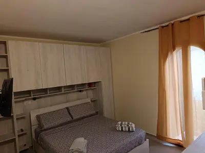 Letto o letti in una camera di Casa Giulia
