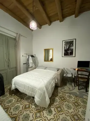 Letto o letti in una camera di Monolocale studio 18