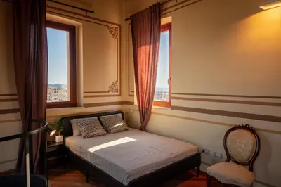 Letto o letti in una camera di Superattico Villanova