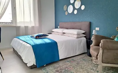 Letto o letti in una camera di BlueCharme modern apartment