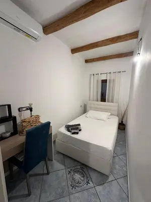 Letto o letti in una camera di Le pietre di Mario