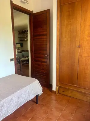 Letto o letti in una camera di Villa Giò Geremeas fronte mare