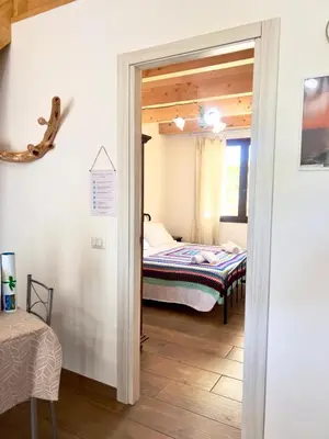 Letto o letti in una camera di Casa vacanza Il Guardiano Delle Due Baie