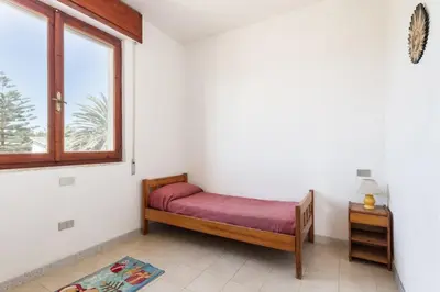 Letto o letti in una camera di La STELLA DI MARE