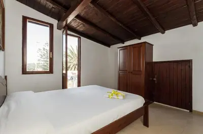 Letto o letti in una camera di La STELLA DI MARE