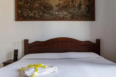 Letto o letti in una camera di La STELLA DI MARE