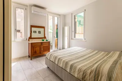 Letto o letti in una camera di Verde Marina - Cagliari Old Town