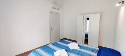 Letto o letti in una camera di Casa Nonno Remo