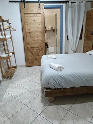 Letto o letti in una camera di La casetta nel centro