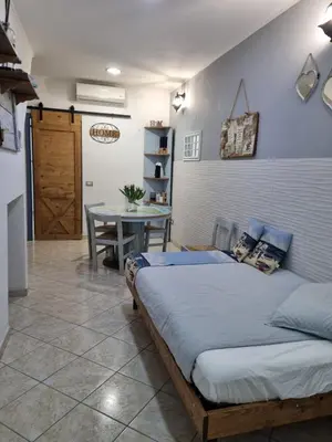Letto o letti in una camera di La casetta nel centro