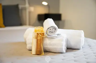 Letto o letti in una camera di Via Giardini House