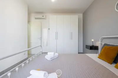 Letto o letti in una camera di Via Giardini House