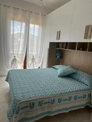 Letto o letti in una camera di Domu Simius