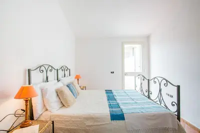 Letto o letti in una camera di Sun House 4 Villasimius City Center AirConditioned