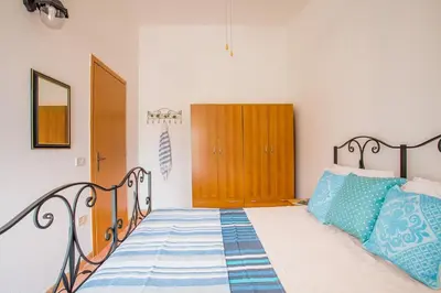 Letto o letti in una camera di Sun House 4 Villasimius City Center AirConditioned