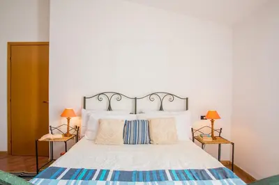 Letto o letti in una camera di Sun House 4 Villasimius City Center AirConditioned