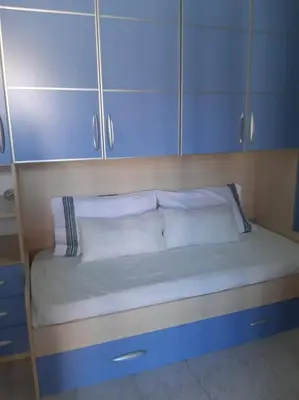 Letto o letti in una camera di Casa simius
